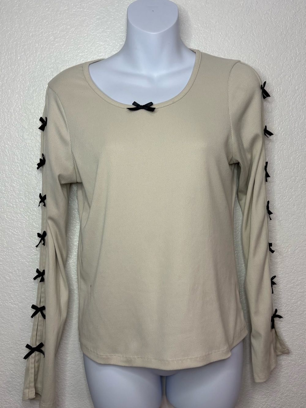 Beige Long-Sleeve Ribbed Top with Black Bow Trim